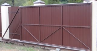 Купить откатные ворота из профнастила Ефремов, цена от 1800 руб.