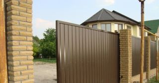 Купить откатные ворота из профнастила Ефремов, цена от 1800 руб.